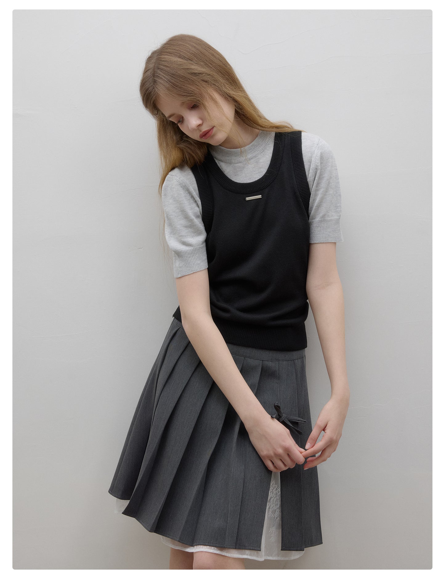Contrast-Color Puff-Sleeve Knit Top With Faux-Layered Vest