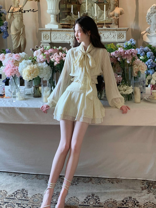 Tie Neck Striped Blouse & Tiered Skirt