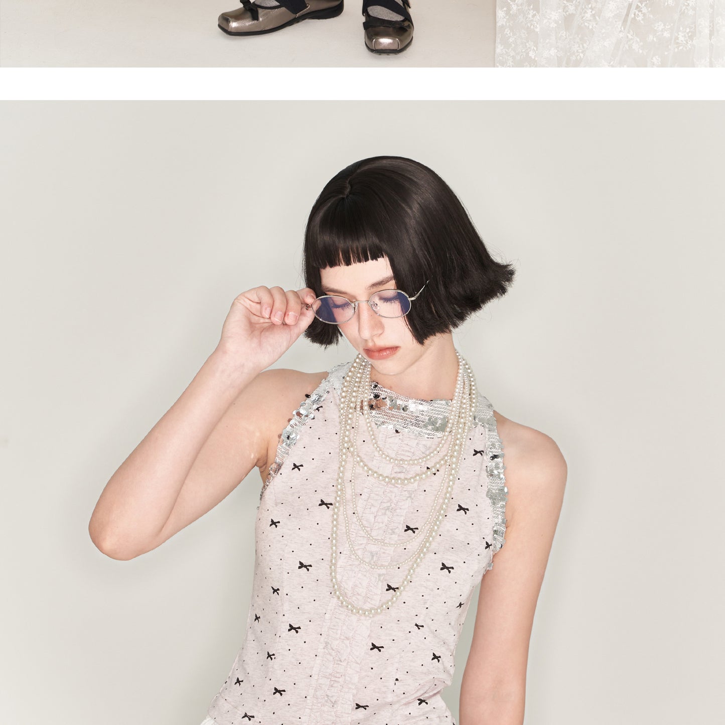 Polka Dot Ruffled Sleeveless Top With Sequin Neckline