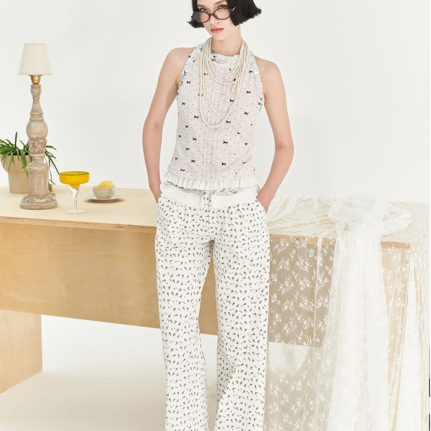 Polka Dot Ruffled Sleeveless Top With Sequin Neckline