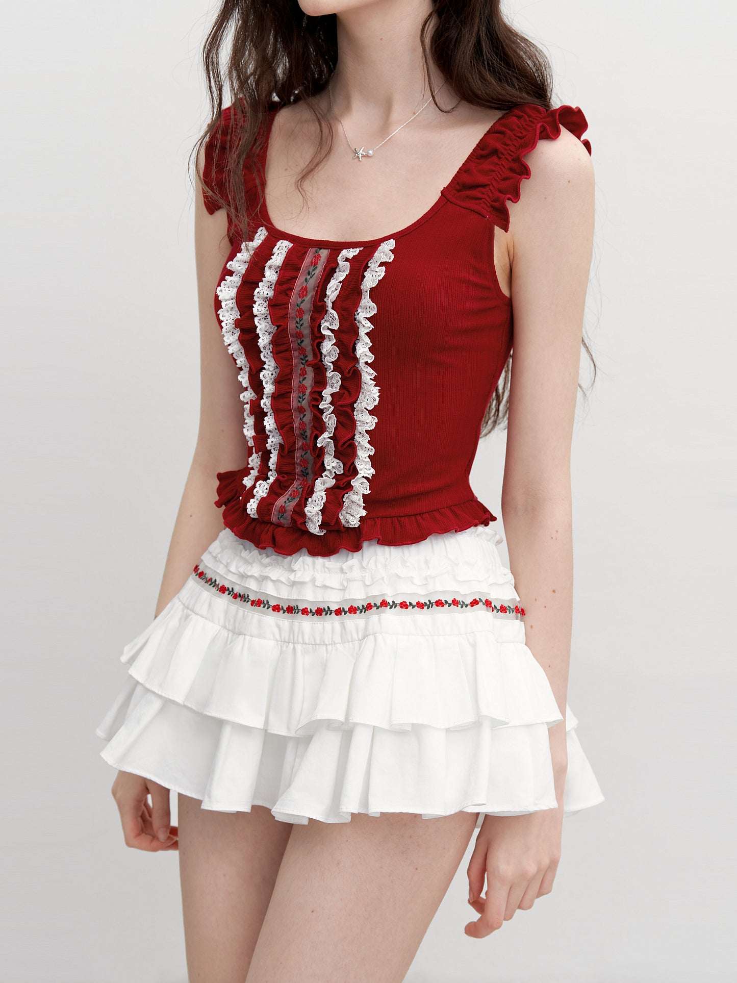 Sleeveless Cropped Ruffle Top With Floral Detail