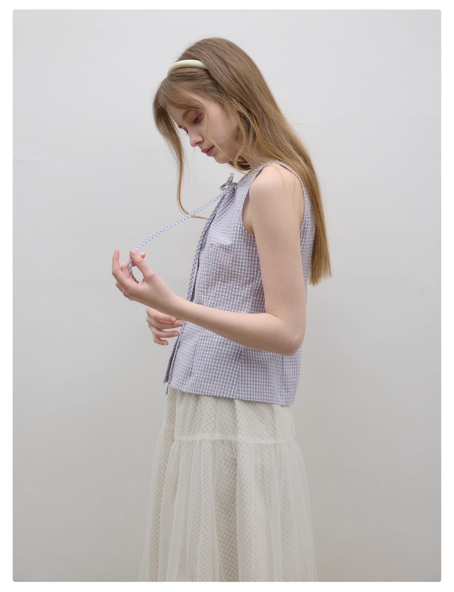 Sleeveless Button-Up Shirt With Gathered Tie Neck