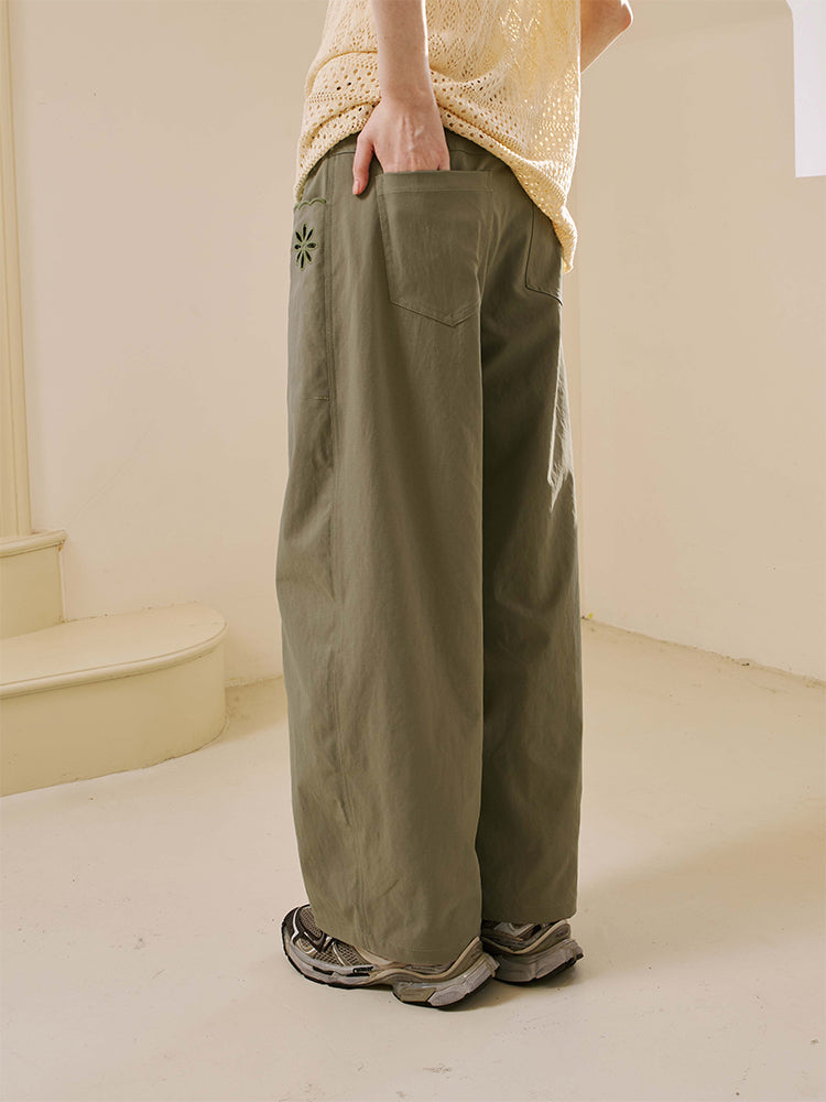 Floral Cutout Pocket Relaxed Fit Curved Pants