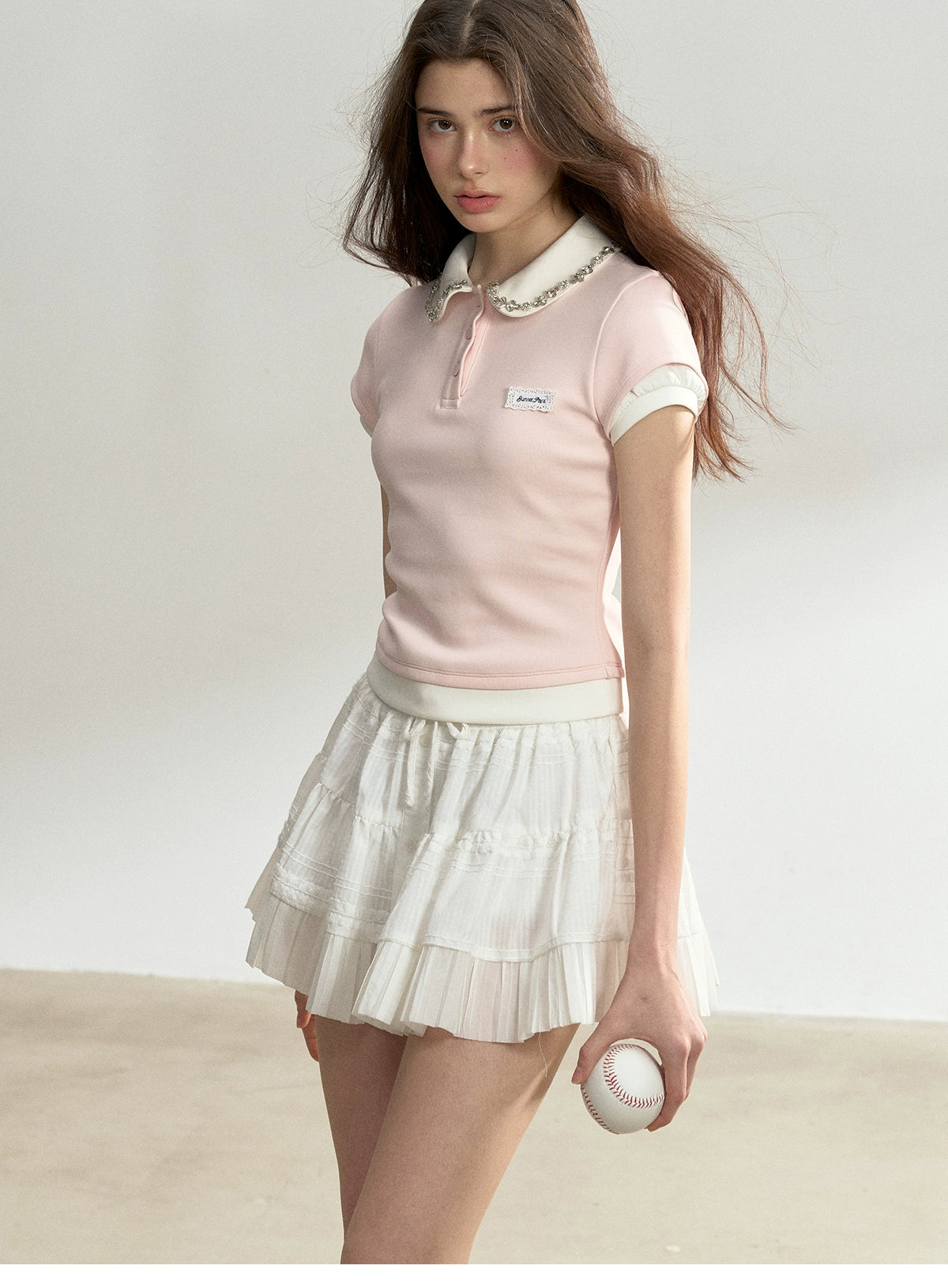 Button-Detailed Pleated Mini Skirt