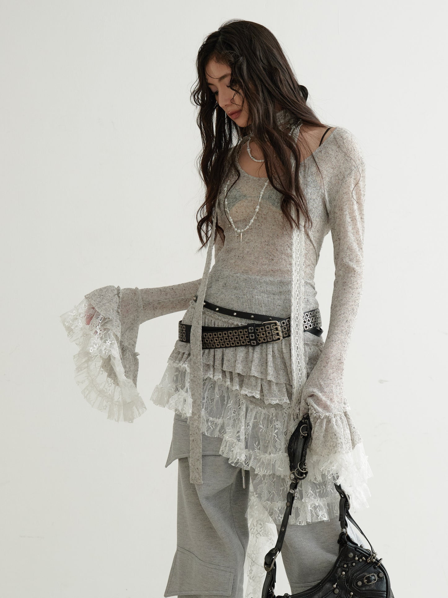 Sheer Knit Top With Asymmetric Ruffled Lace Hem