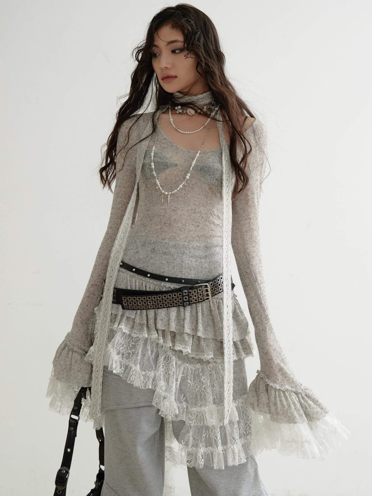 Sheer Knit Top With Asymmetric Ruffled Lace Hem