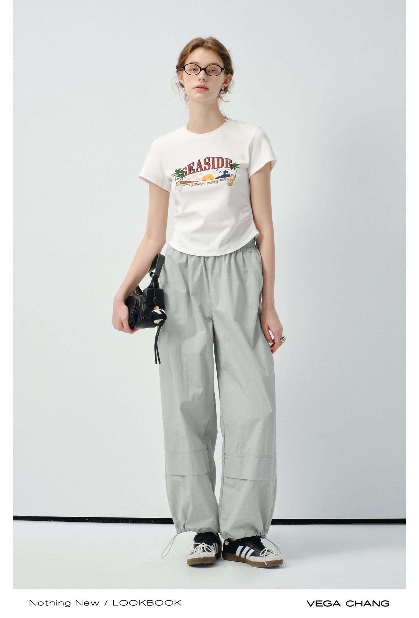 Round Hem Printed T-Shirt And Drawstring Nylon Pants