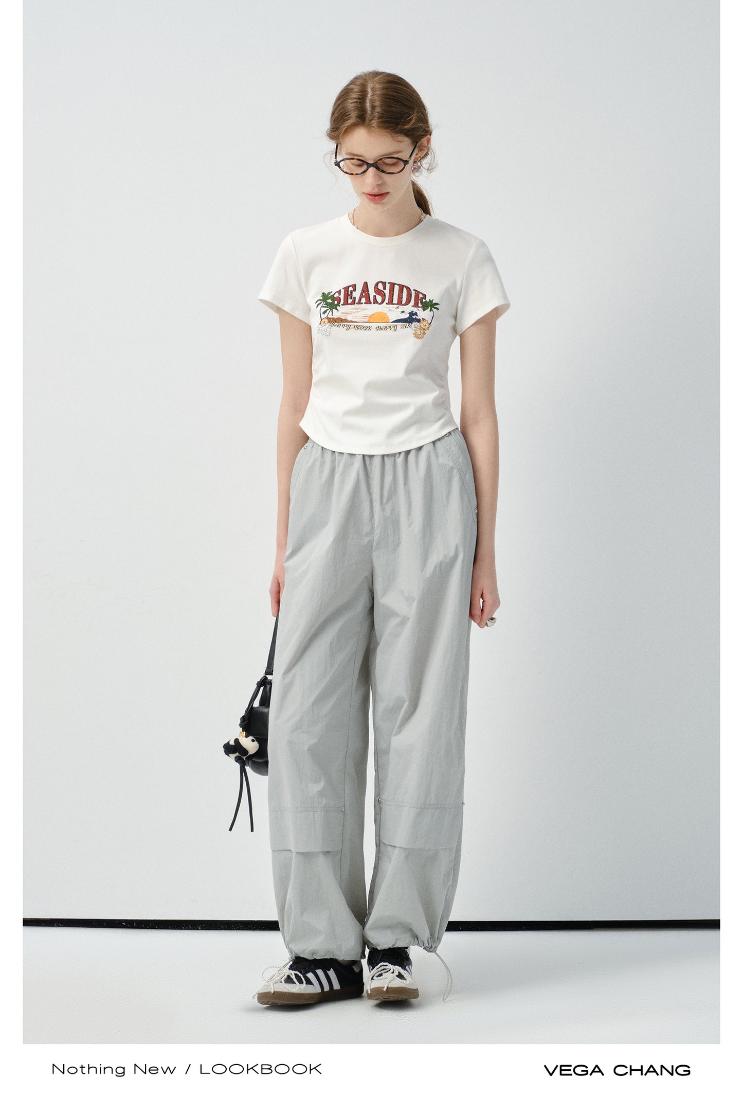 Round Hem Printed T-Shirt And Drawstring Nylon Pants