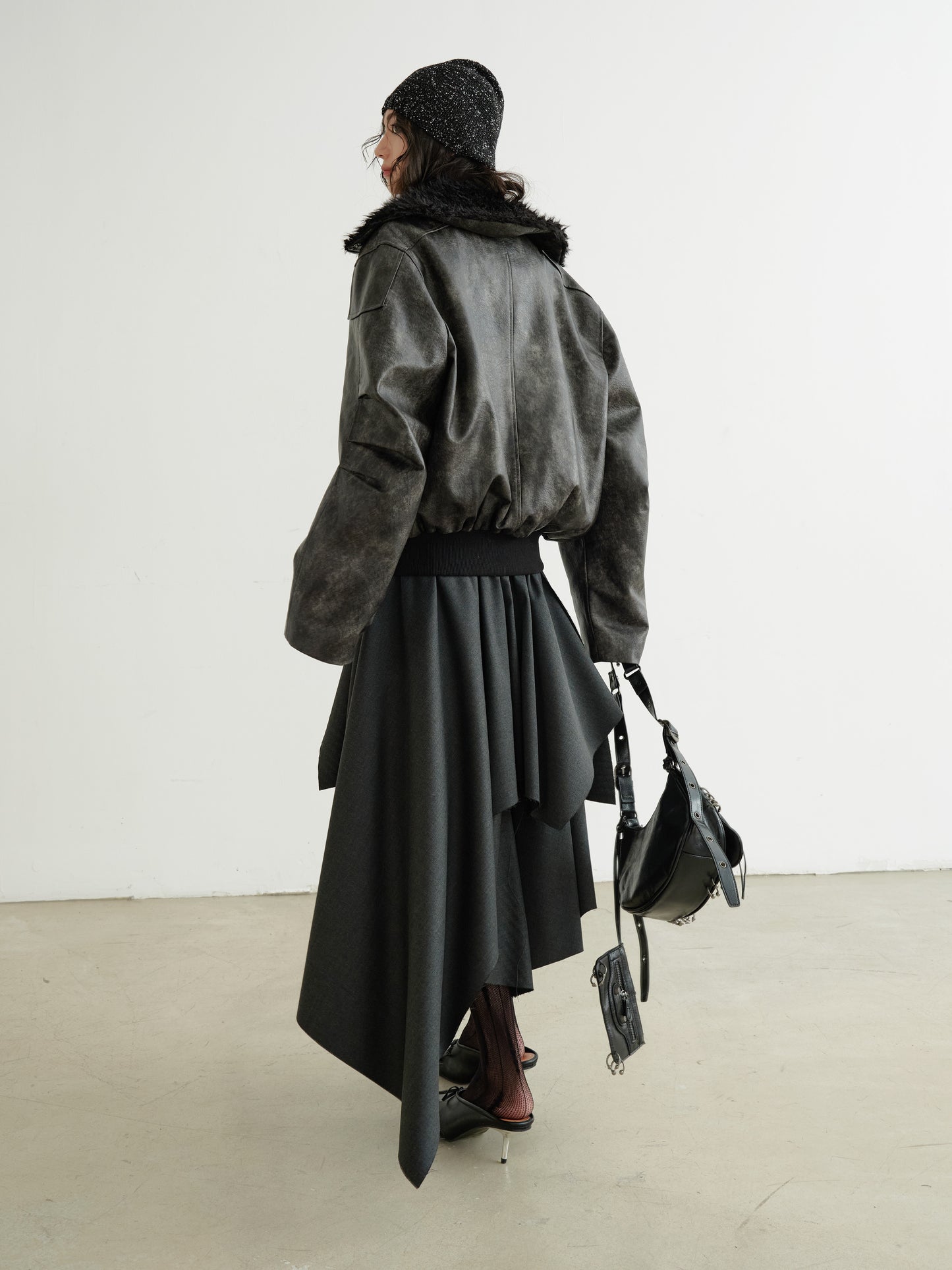 Edgy Tiered Asymmetric Skirt With Studded Belt