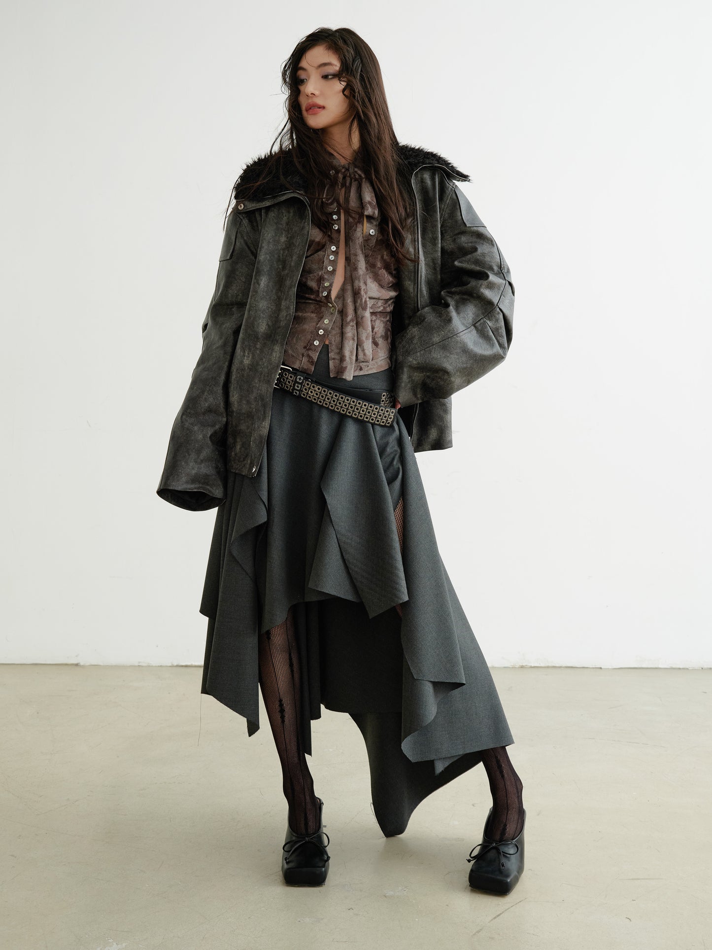 Edgy Tiered Asymmetric Skirt With Studded Belt