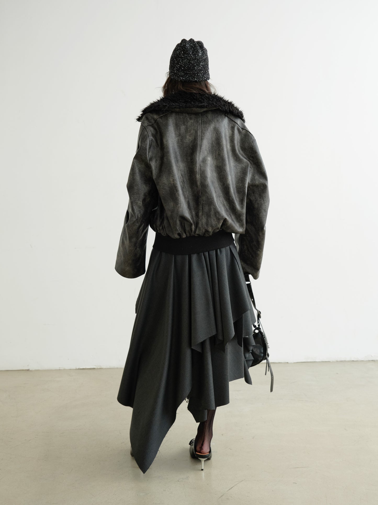 Edgy Tiered Asymmetric Skirt With Studded Belt