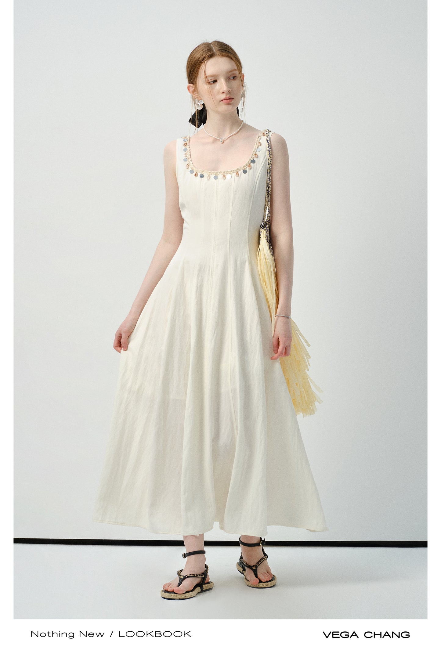 Sleeveless Dress With Shell-Decorated Neckline