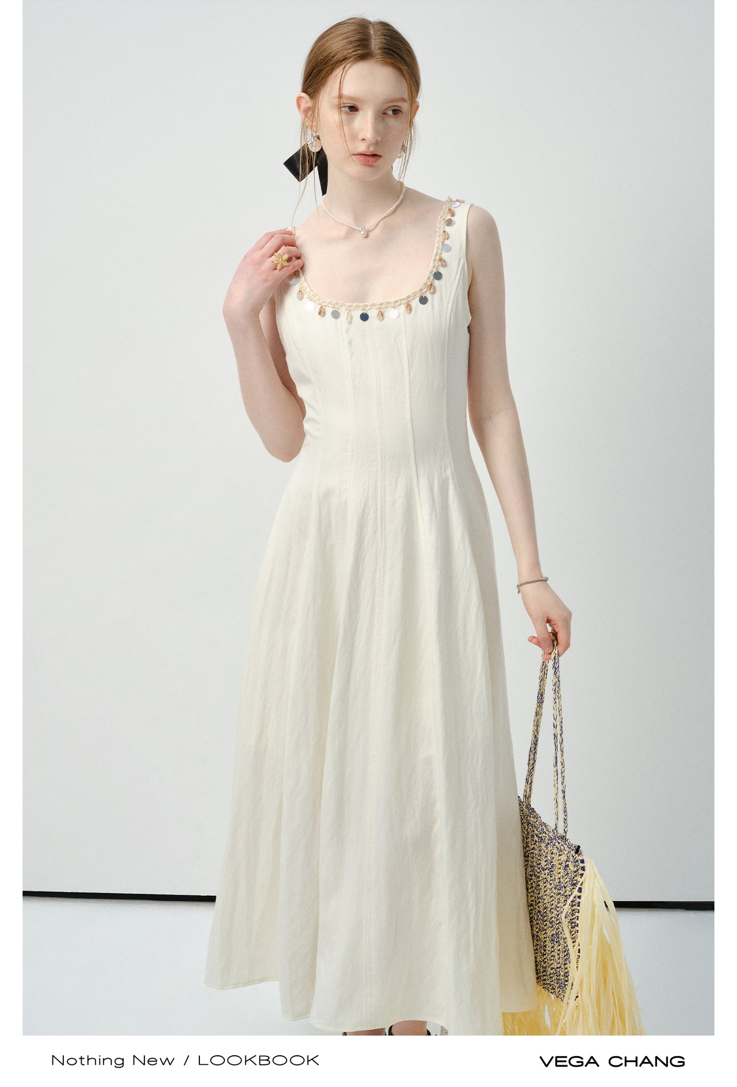 Sleeveless Dress With Shell-Decorated Neckline