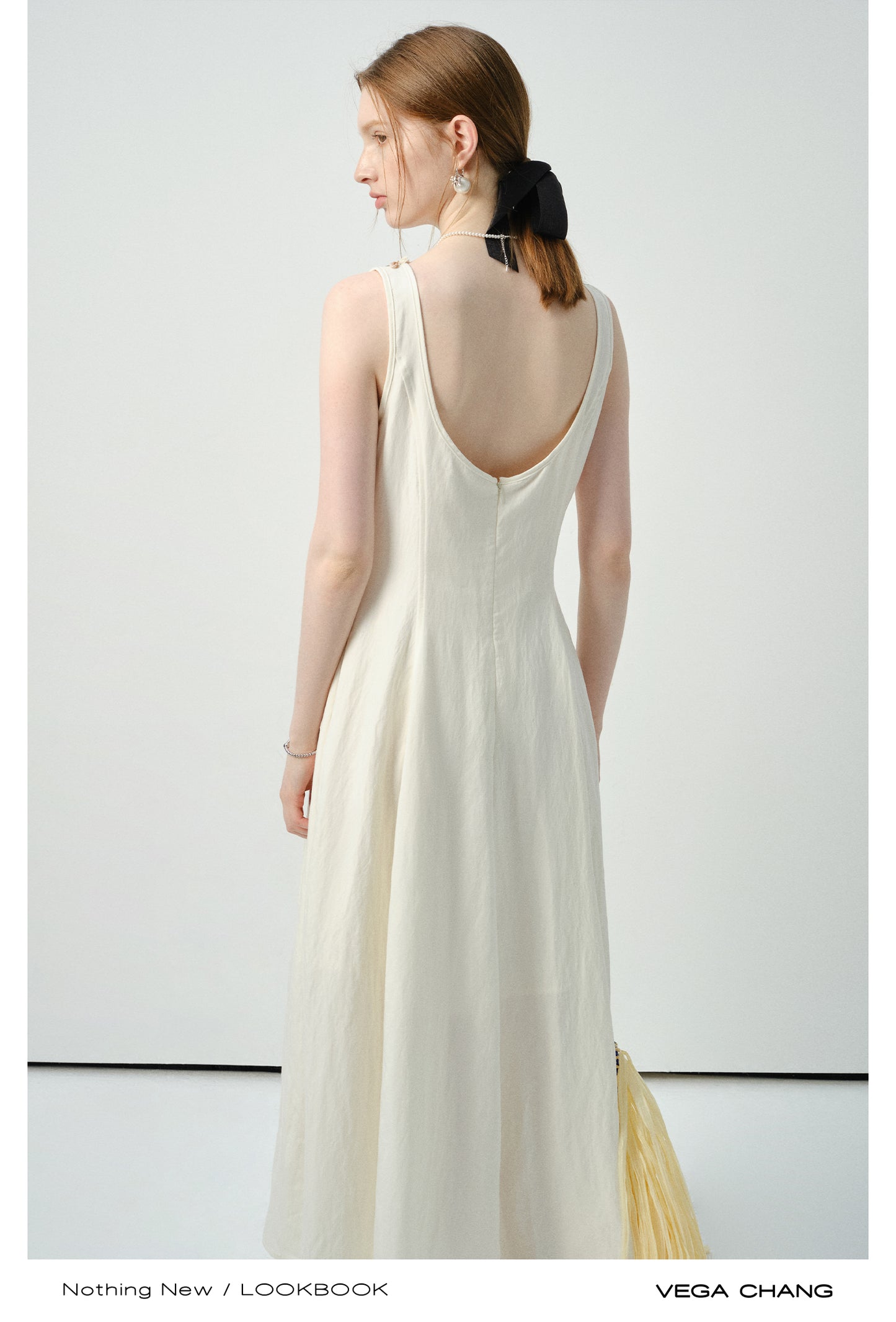 Sleeveless Dress With Shell-Decorated Neckline