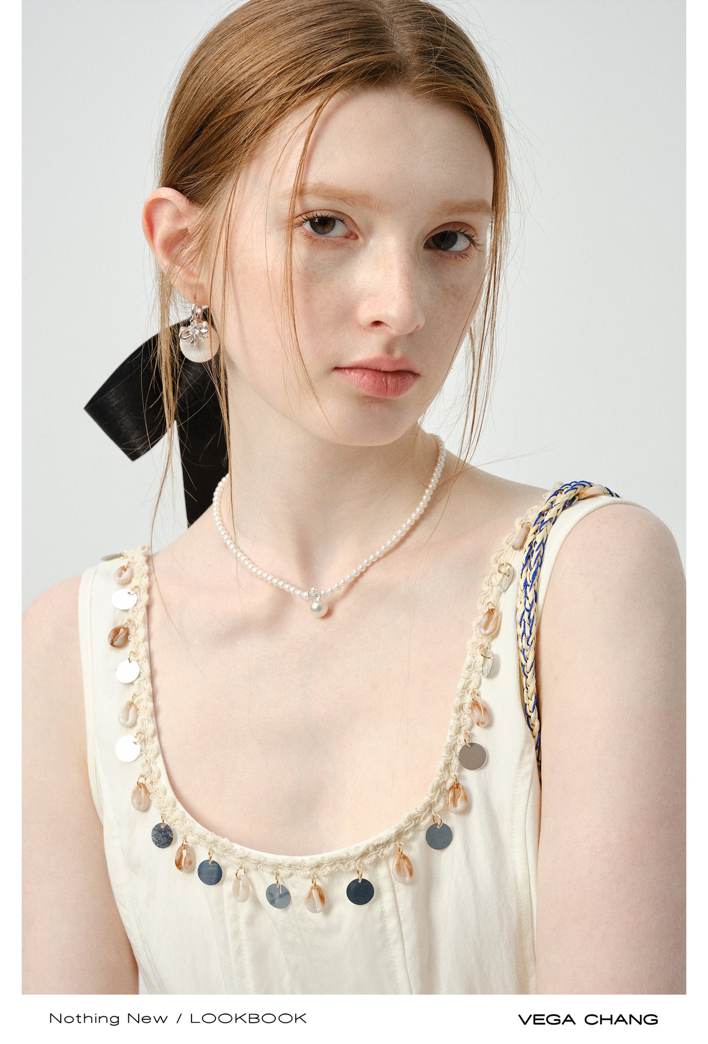 Sleeveless Dress With Shell-Decorated Neckline