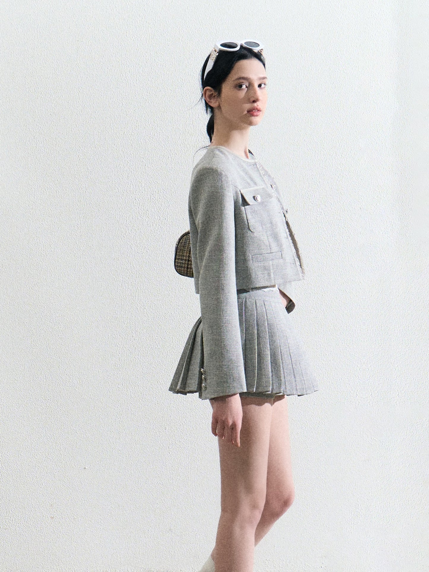 Fringed Cropped Jacket And High-Waisted Pleated Skirt