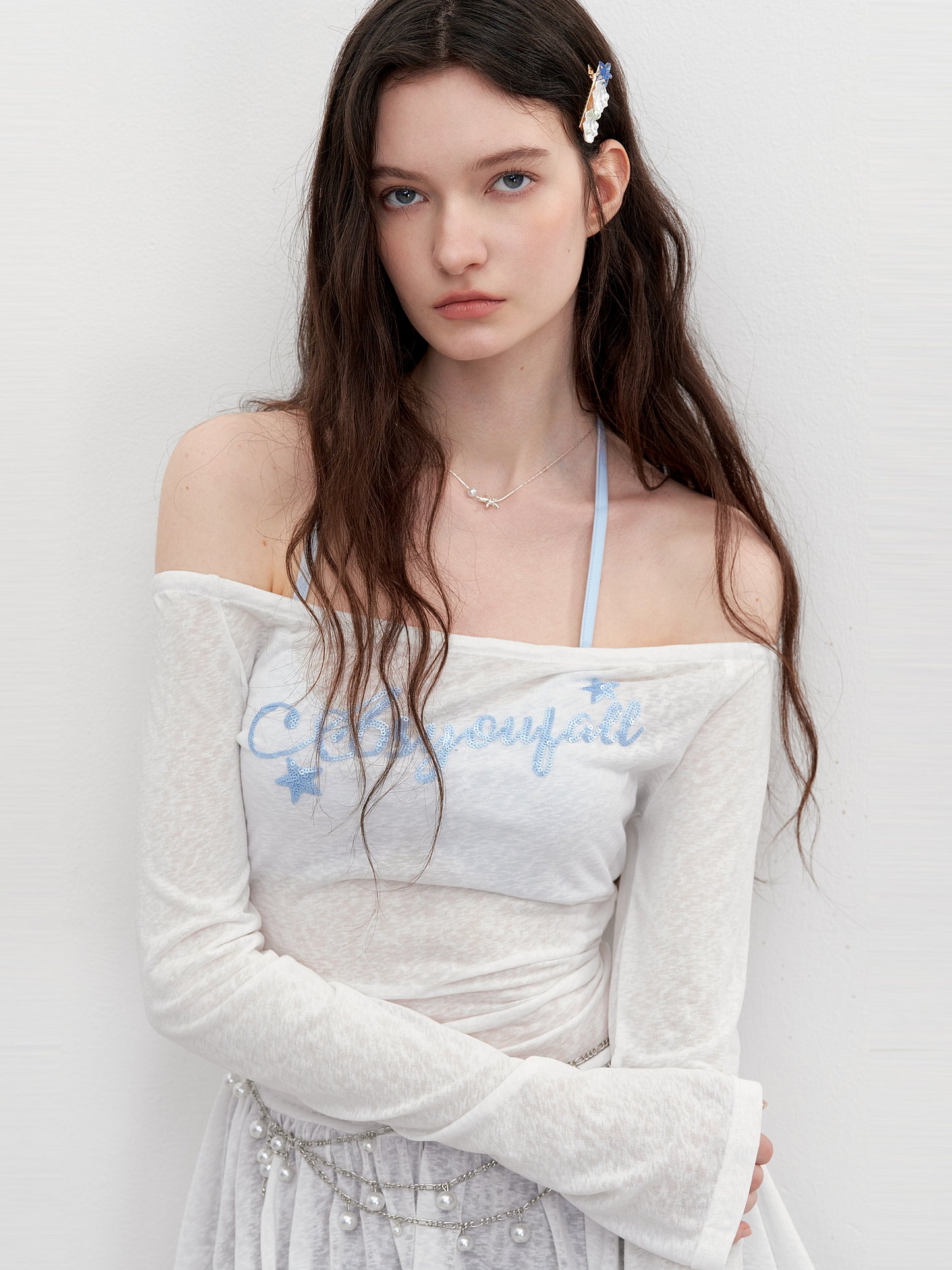 Off-Shoulder Peplum Top With Sequin Lettering