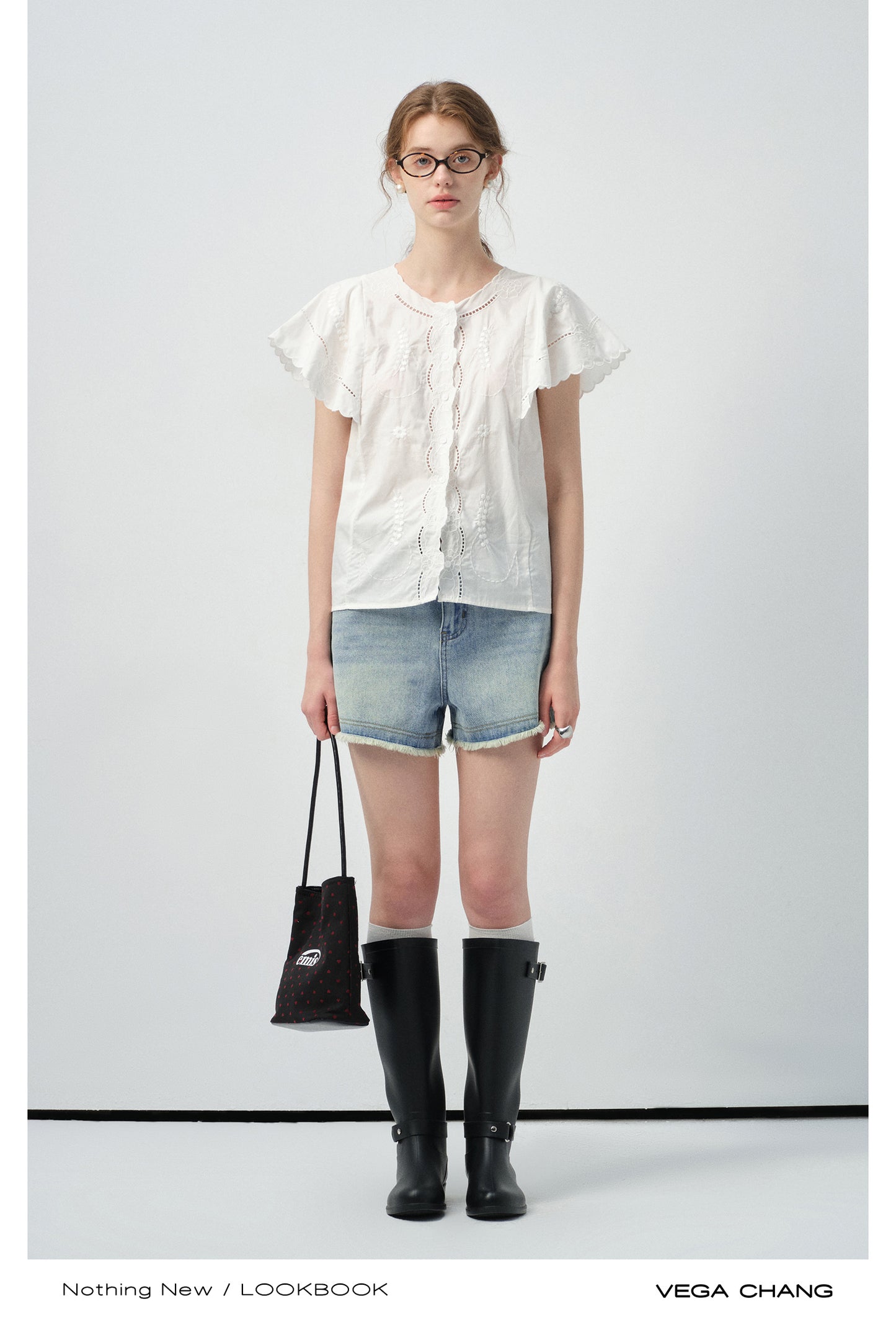 High-Waist Washed Denim Raw-Edge Shorts