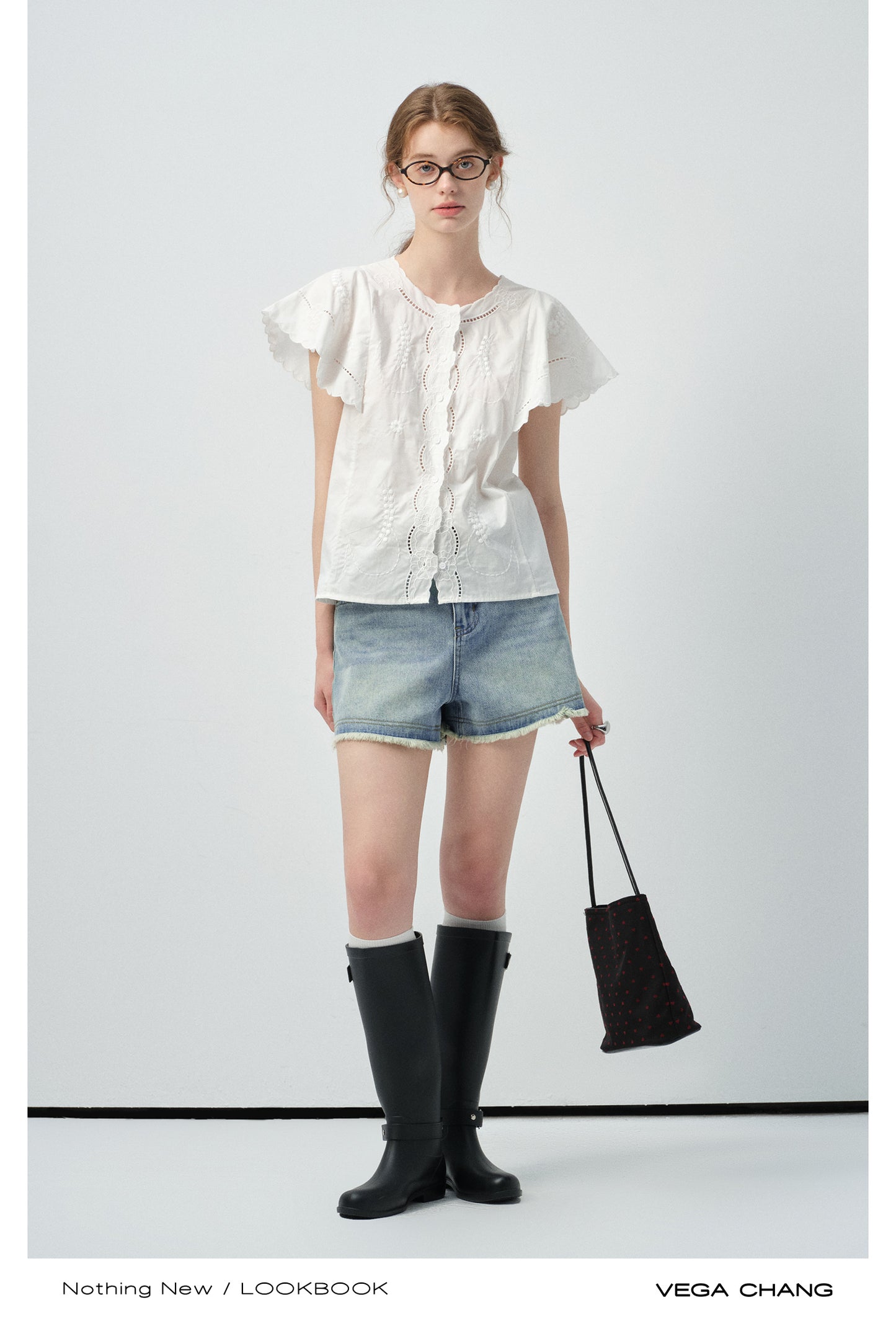 High-Waist Washed Denim Raw-Edge Shorts