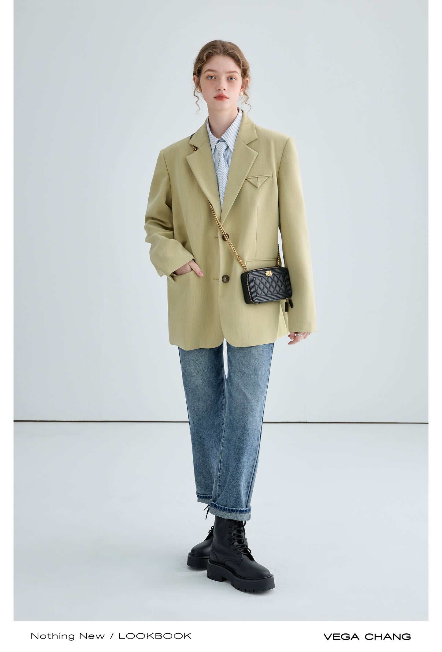 Shoulder-Padded Blazer With Varied Cuff Buttons