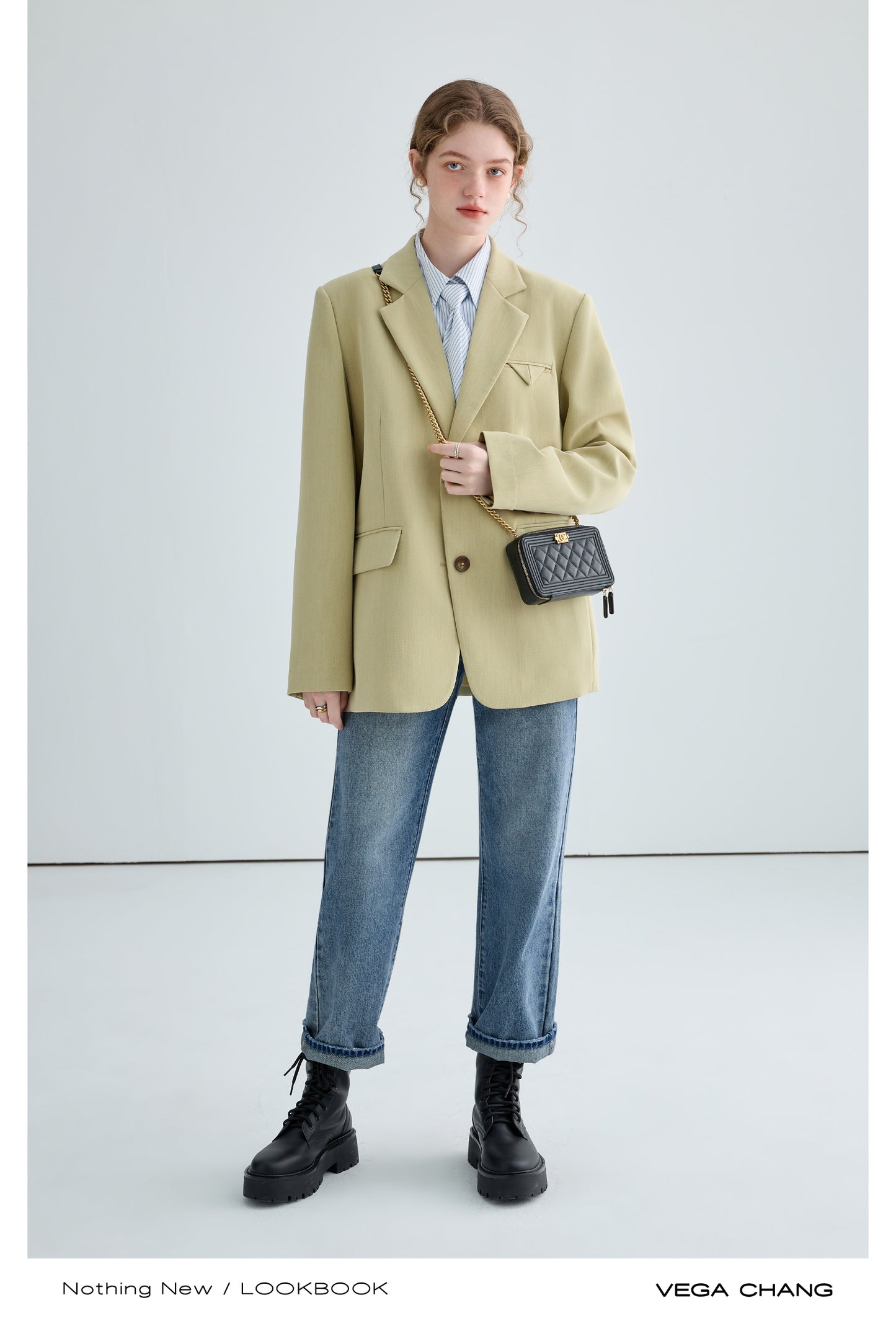 Shoulder-Padded Blazer With Varied Cuff Buttons