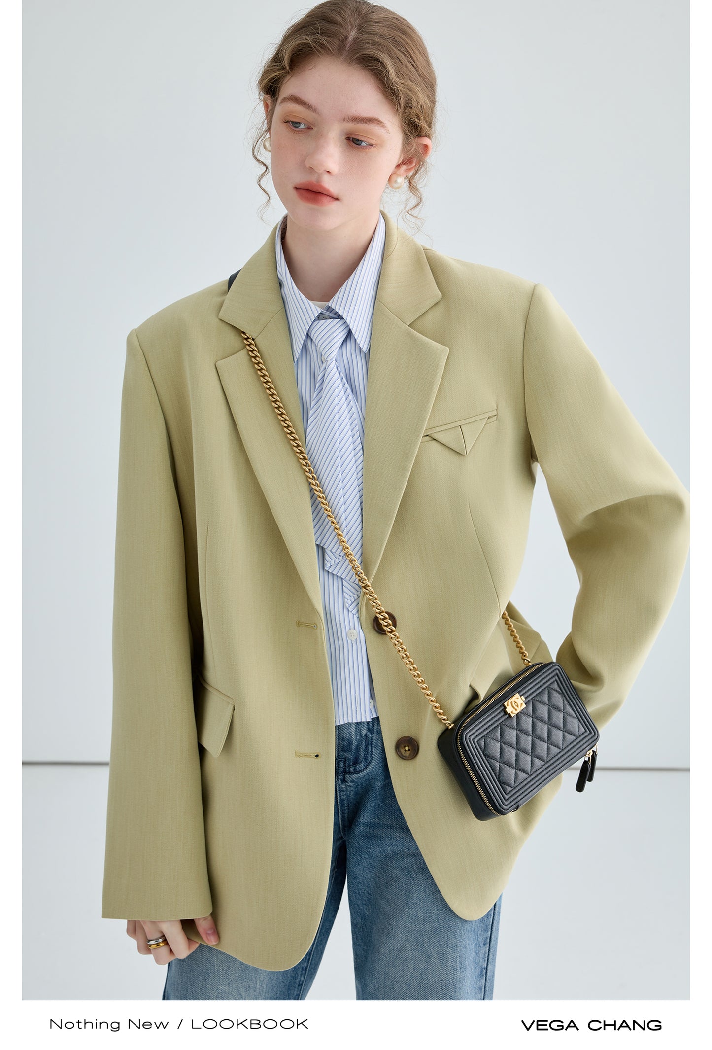 Shoulder-Padded Blazer With Varied Cuff Buttons