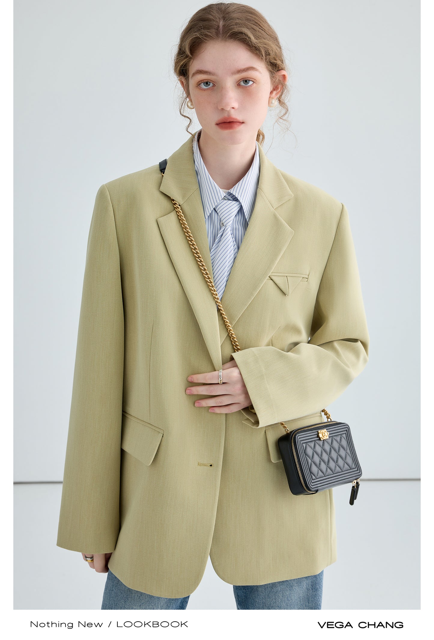 Shoulder-Padded Blazer With Varied Cuff Buttons