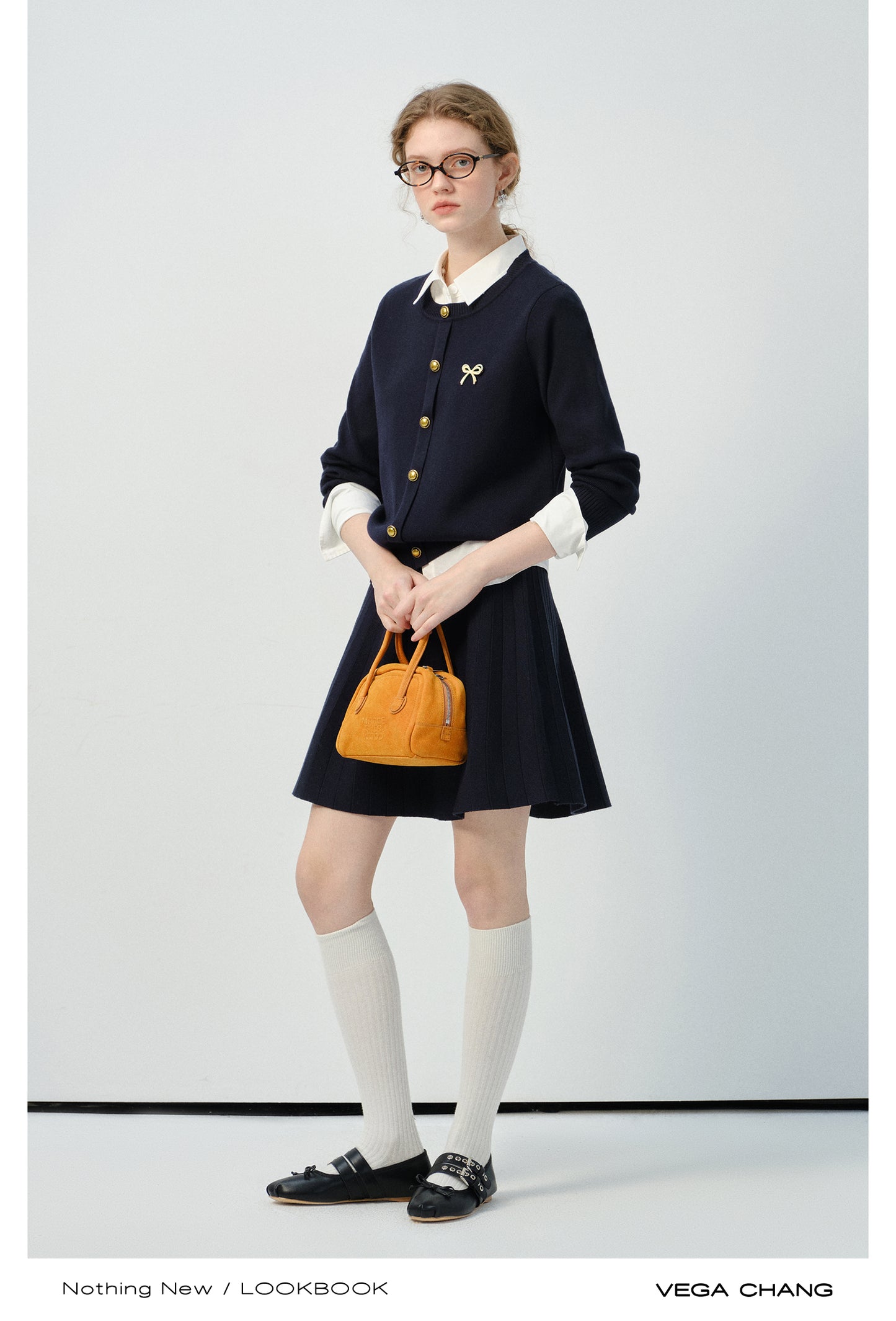 Bow Brooch Accent Knitted Cardigan And Pleated Skirt