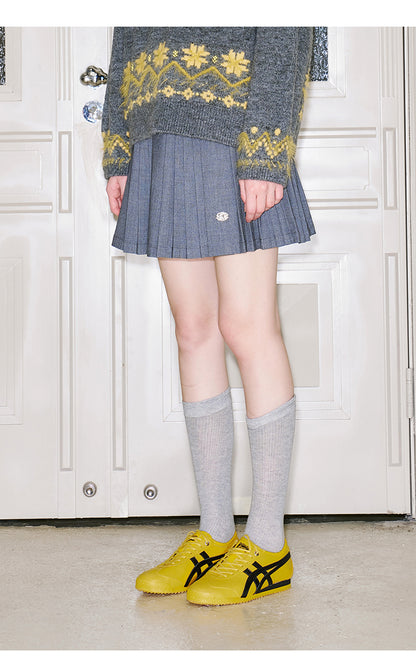 Short Pleated Skirt With Logo Charm