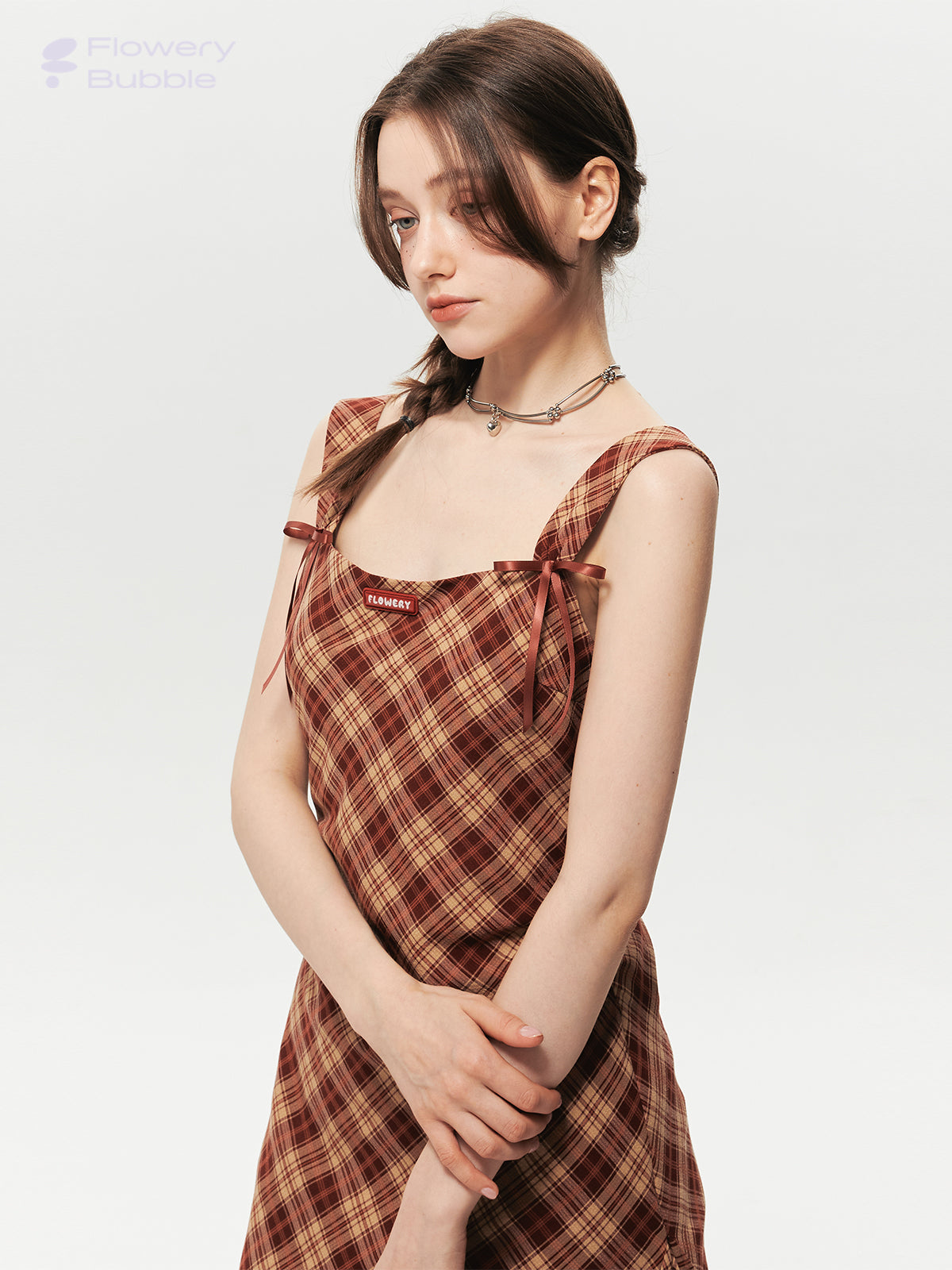 Asymmetrical Strapped Dress In Diamond Plaid With Bow Detail