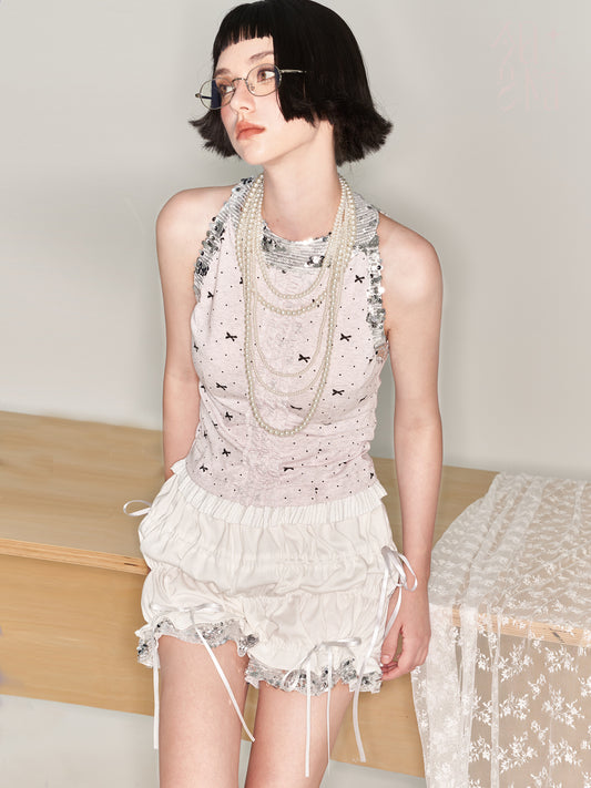 Polka Dot Ruffled Sleeveless Top With Sequin Neckline