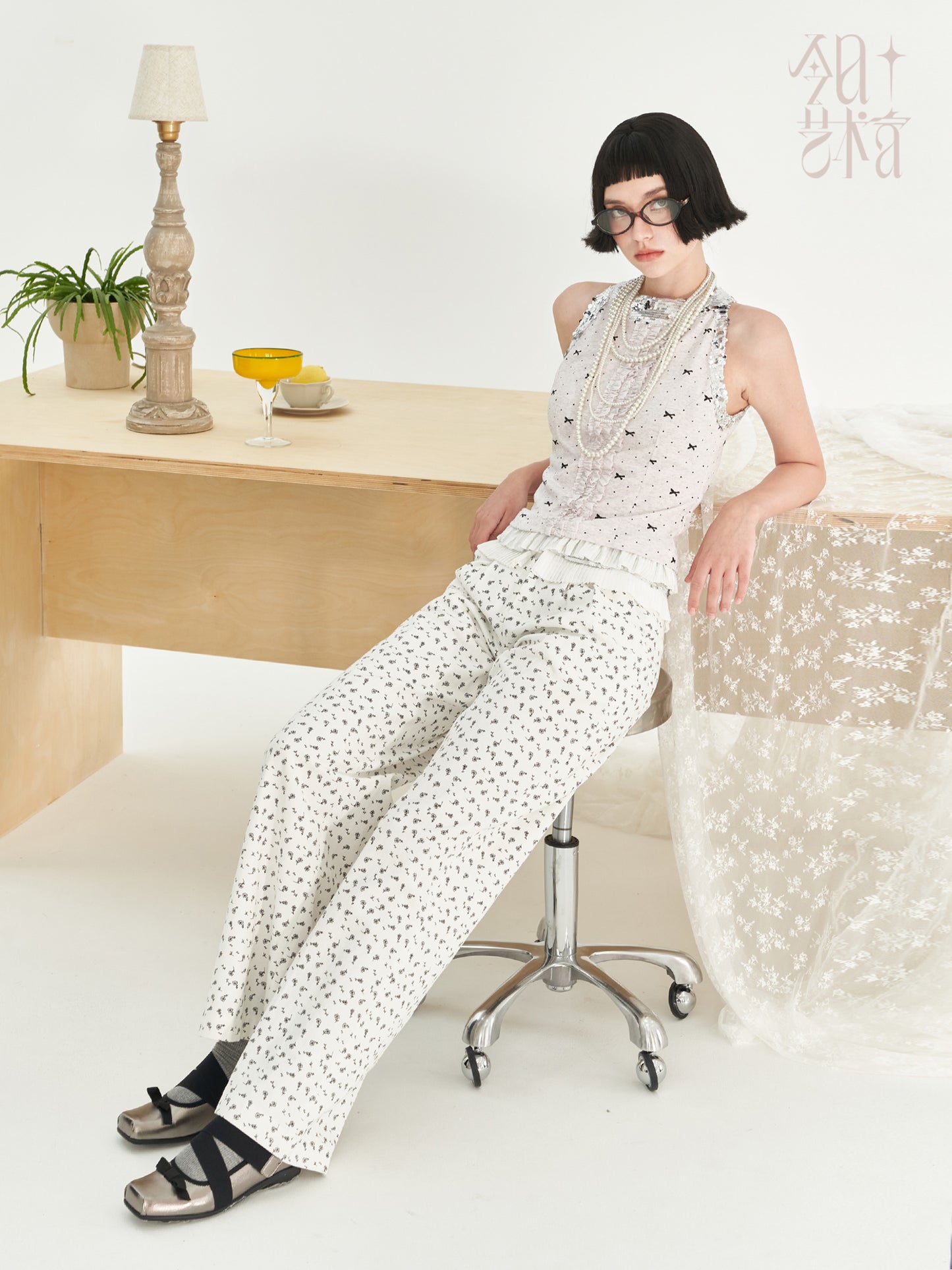 Polka Dot Ruffled Sleeveless Top With Sequin Neckline