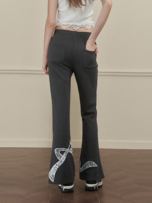 Flared Jogger Pants With Drawstring And Lace Bow Detail