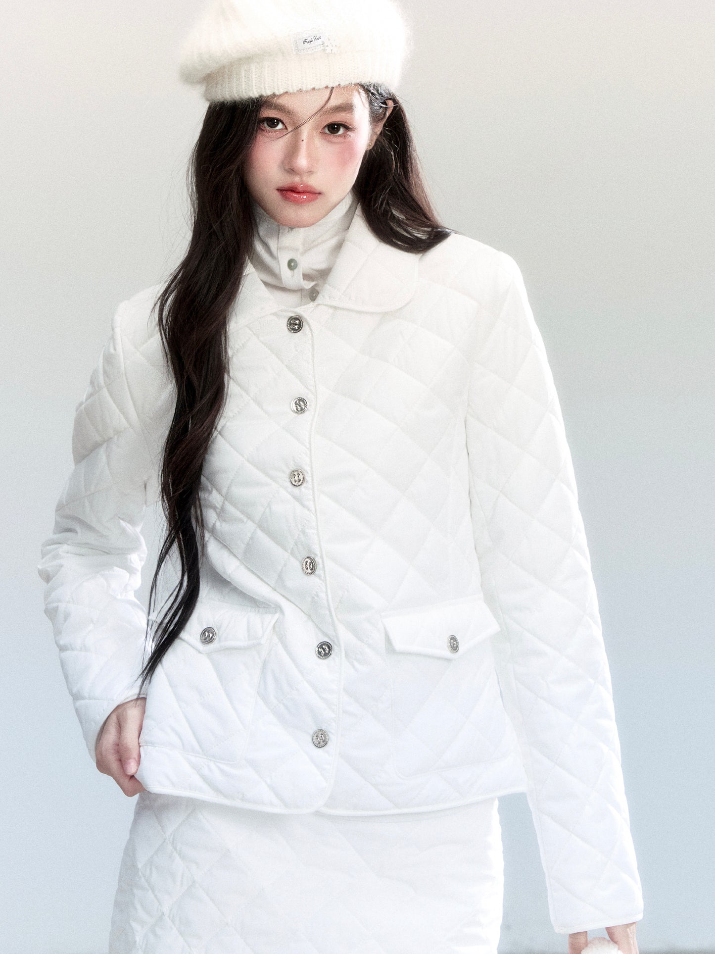 Diamond-Quilted Jacket And Mini Skirt