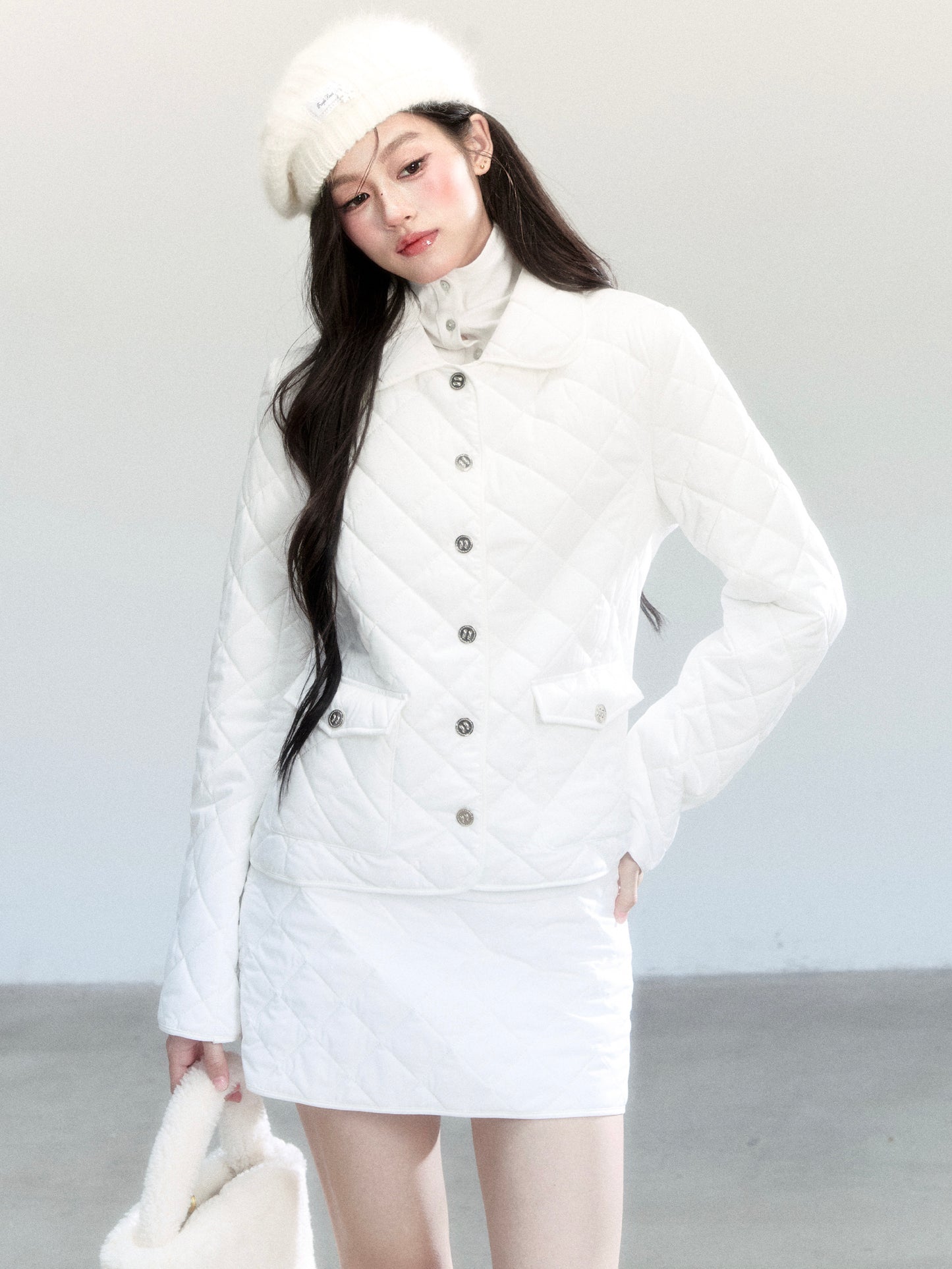 Diamond-Quilted Jacket And Mini Skirt