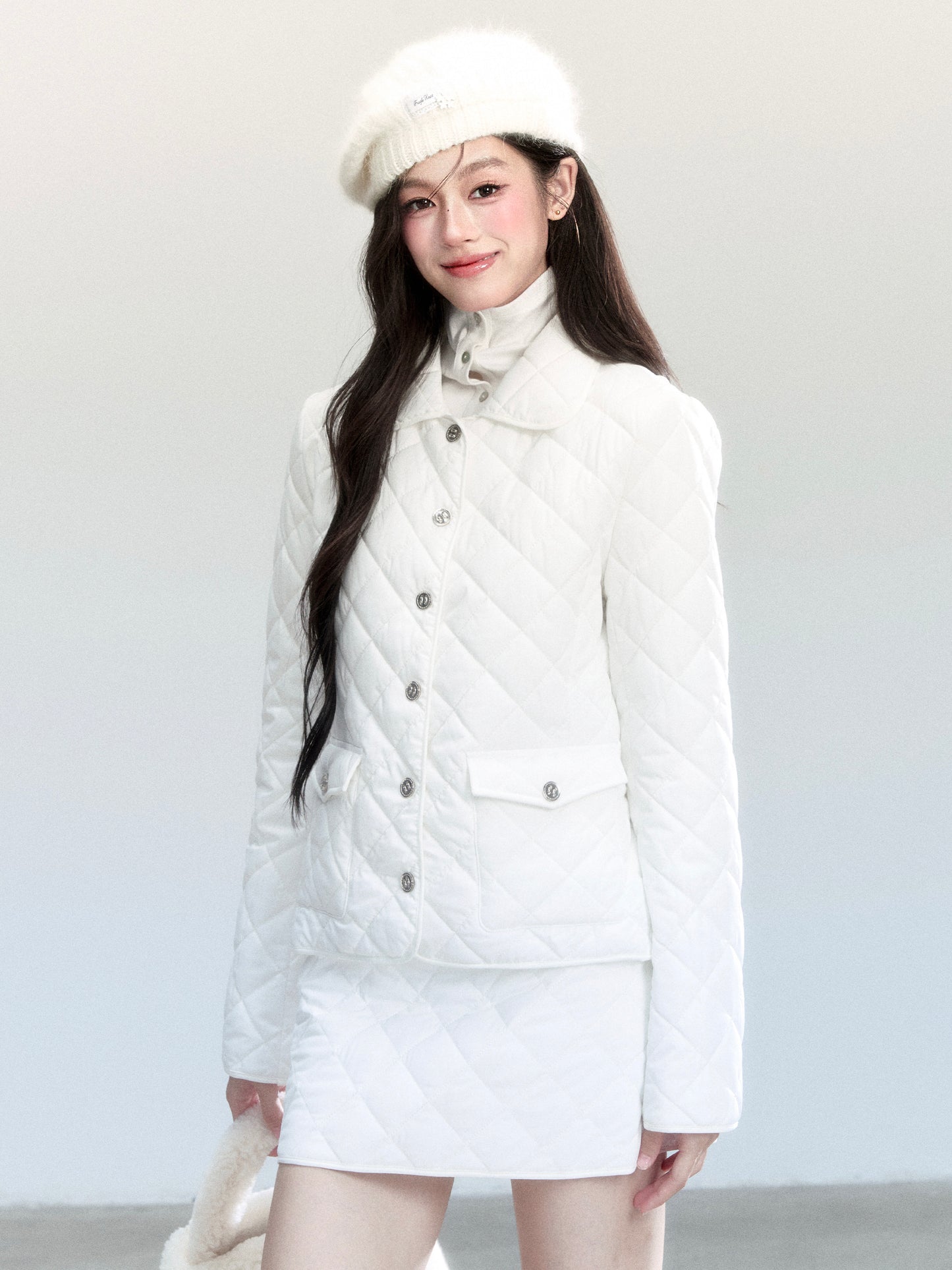 Diamond-Quilted Jacket And Mini Skirt