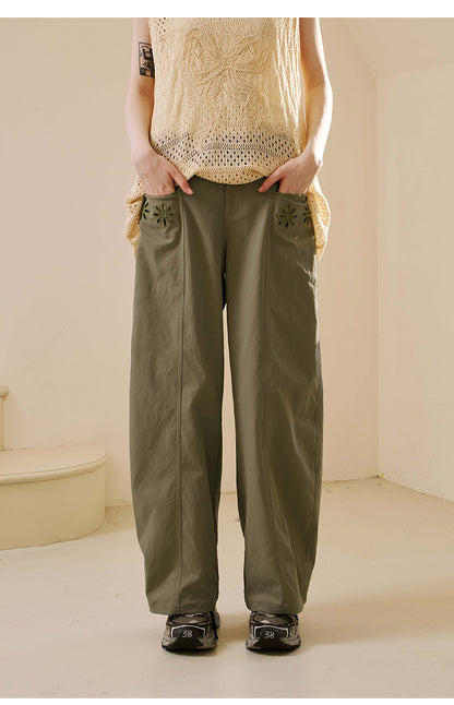 Floral Cutout Pocket Relaxed Fit Curved Pants