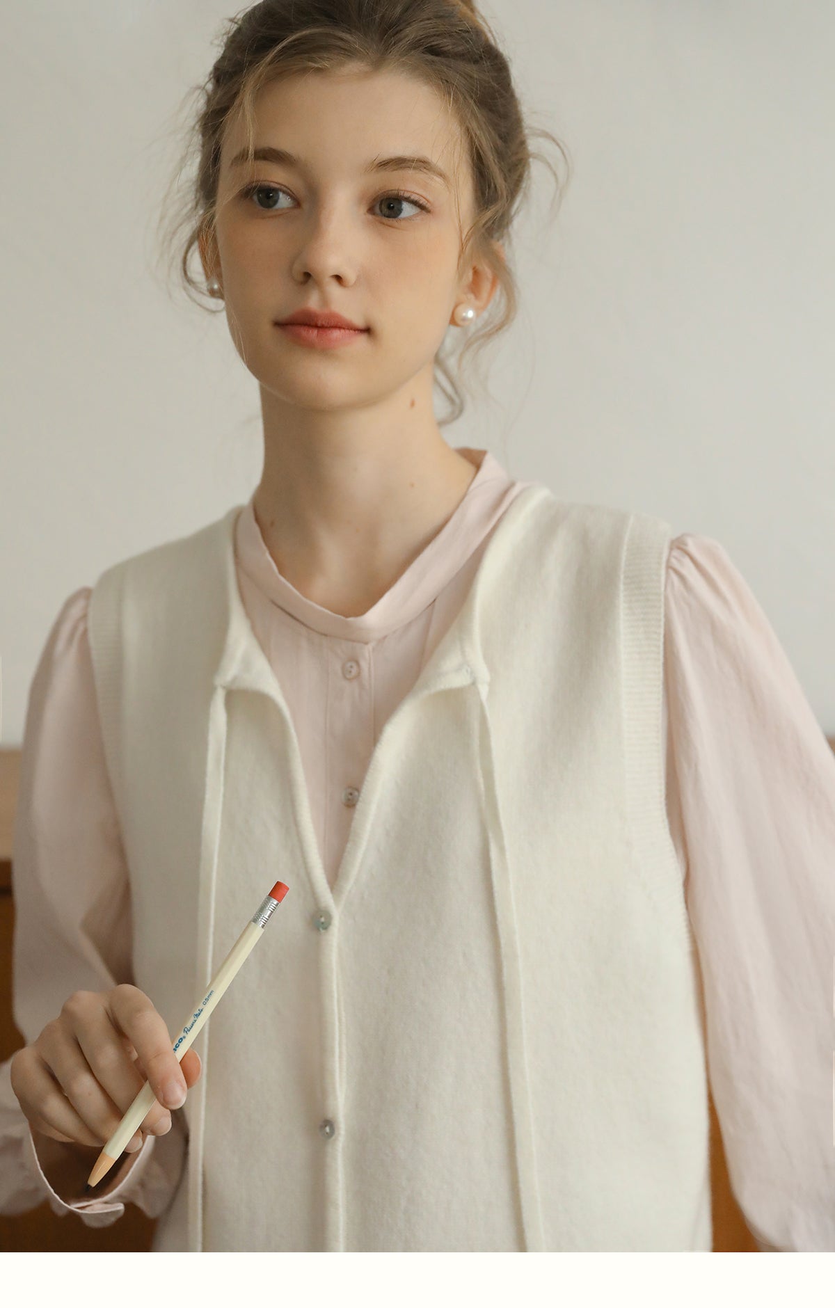 Buttoned Wool Vest With Tie Neck