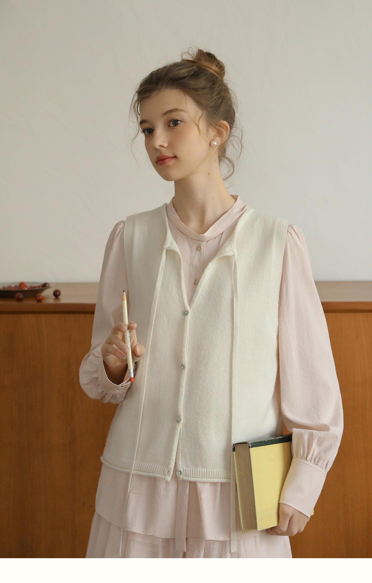 Buttoned Wool Vest With Tie Neck