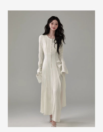 Flowy Tuck Dress With Flared Cuffs