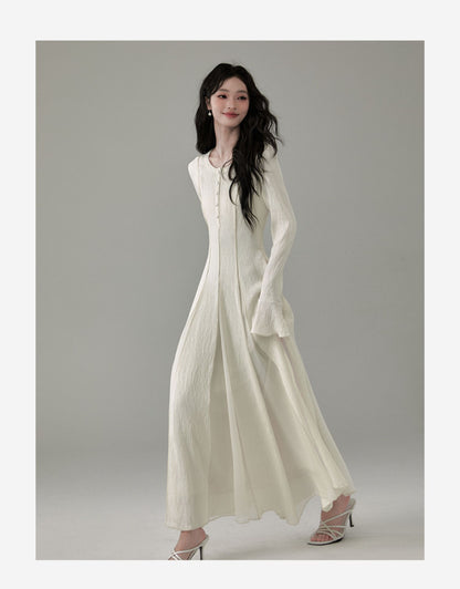 Flowy Tuck Dress With Flared Cuffs