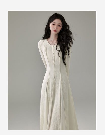 Flowy Tuck Dress With Flared Cuffs