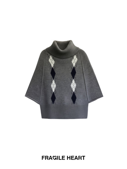 Cape-Inspired Roll Neck Argyle Knit Top