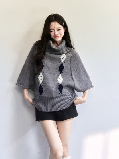 Cape-Inspired Roll Neck Argyle Knit Top