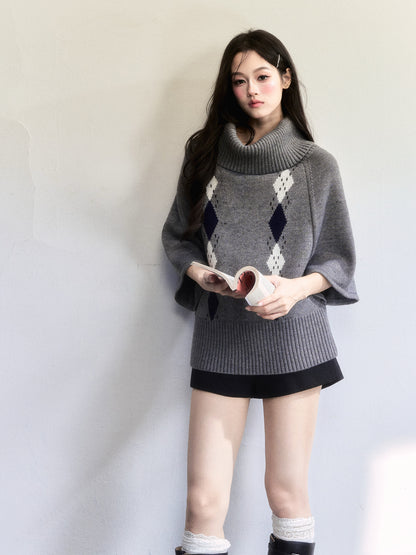 Cape-Inspired Roll Neck Argyle Knit Top
