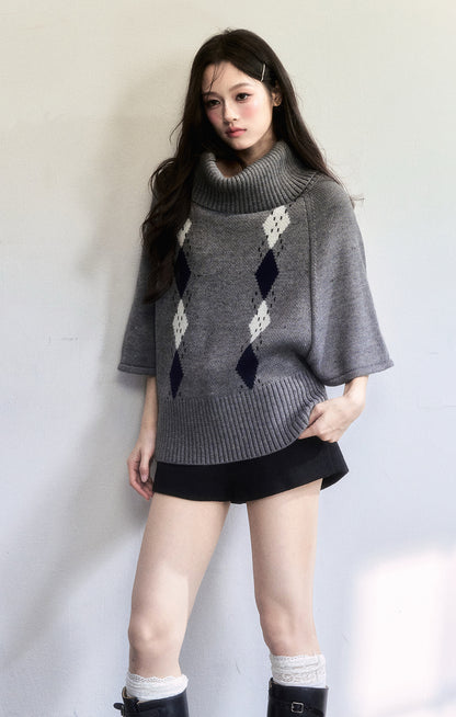 Cape-Inspired Roll Neck Argyle Knit Top