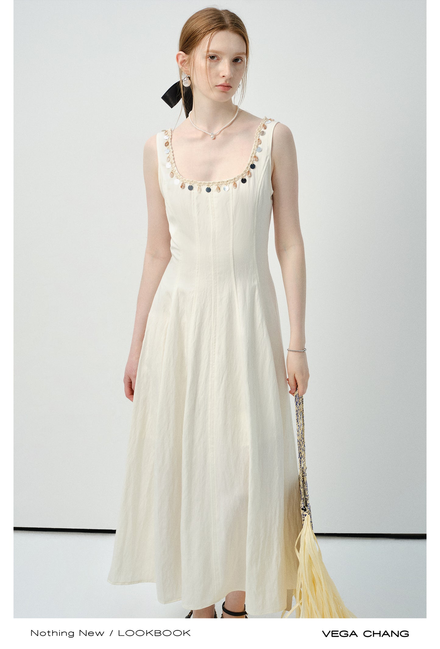 Sleeveless Dress With Shell-Decorated Neckline