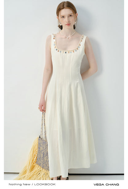 Sleeveless Dress With Shell-Decorated Neckline
