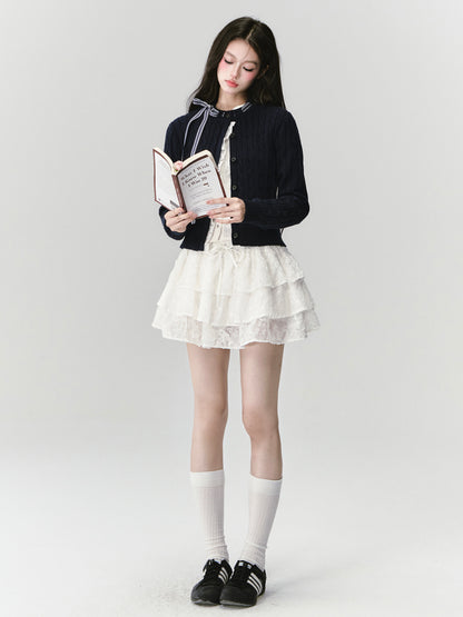 Ruffled Cable Knit Cardigan With Plaid Ribbon Detail