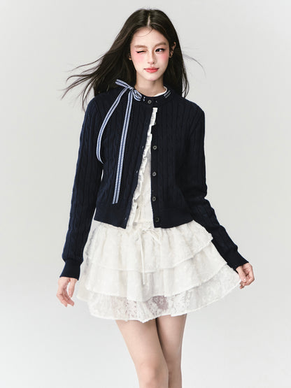 Ruffled Cable Knit Cardigan With Plaid Ribbon Detail